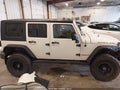 2008 Jeep Wrangler Unlimited — photo 13 of 16 | VIN 1J4GA69138L540571