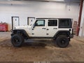 2008 Jeep Wrangler Unlimited — photo 14 of 16 | VIN 1J4GA69138L540571