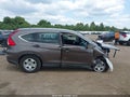 2015 Honda CR-V — photo 14 of 17 | VIN 2HKRM4H39FH699318