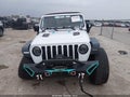 2018 Jeep Wrangler Unlimited — photo 12 of 16 | VIN 1C4HJXFG9JW212729