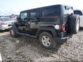 2017 Jeep Wrangler Unlimited — photo 3 of 16 | VIN 1C4BJWDG5HL696879