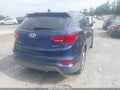 2017 Hyundai Santa Fe — photo 4 of 16 | VIN 5XYZU3LB7HG383628