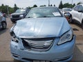 2013 Chrysler 200 — photo 12 of 16 | VIN 1C3BCBFGXDN755556