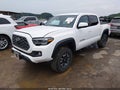 2023 Toyota Tacoma — photo 2 of 12 | VIN 3TMCZ5AN6PM633815