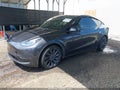2024 Tesla Model Y — photo 2 of 19 | VIN 7SAYGDEF9RA267185