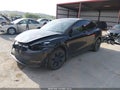 2025 Tesla Model Y — photo 2 of 15 | VIN 7SAYGDEE2SF222637