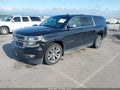 2015 Chevrolet Suburban — photo 2 of 16 | VIN 1GNSKKKCXFR623899