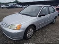 2003 Honda Civic — photo 2 of 11 | VIN 1HGES166X3L031682