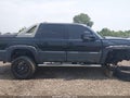 2003 Chevrolet Avalanche — photo 13 of 16 | VIN 3GNGK23G83G172717