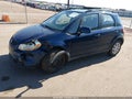 2010 Suzuki SX4 — photo 2 of 16 | VIN JS2YB5A3XA6311314