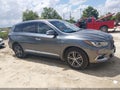 2016 Infiniti QX60 — photo 13 of 16 | VIN 5N1AL0MN5GC511578