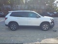 2022 Honda Passport — photo 13 of 16 | VIN 5FNYF8H68NB015136