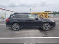 2016 Subaru Outback — photo 13 of 16 | VIN 4S4BSBNCXG3299129
