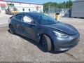 2018 Tesla Model 3 — photo 1 of 15 | VIN 5YJ3E1EAXJF014075