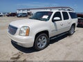 2010 GMC Yukon XL — photo 2 of 16 | VIN 1GKUKKE33AR203623