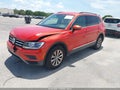 2018 Volkswagen Tiguan — photo 2 of 17 | VIN 3VV3B7AX0JM184528