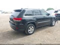 2014 Jeep Grand Cherokee — photo 4 of 16 | VIN 1C4RJFAGXEC240617