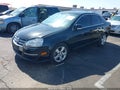 2009 Volkswagen Jetta — photo 2 of 12 | VIN 3VWRZ71K29M152245