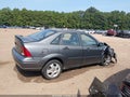 2004 Ford Focus — photo 13 of 16 | VIN 1FAFP38ZX4W116583
