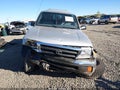2000 Toyota Tacoma — photo 12 of 16 | VIN 5TEWN72N0YZ695573