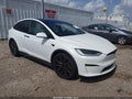 2022 Tesla Model X — photo 1 of 10 | VIN 7SAXCAE53NF357488