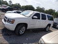 2014 Chevrolet Suburban — photo 14 of 16 | VIN 1GNSKJE76ER153779