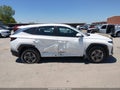 2026 Hyundai Tucson Hybrid — photo 14 of 17 | VIN KM8JADD10TU468508
