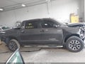 2014 Toyota Tundra — photo 13 of 16 | VIN 5TFDW5F1XEX354653