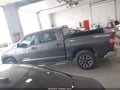 2014 Toyota Tundra — photo 14 of 16 | VIN 5TFDW5F1XEX354653
