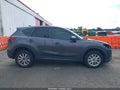 2016 Mazda CX-5 — photo 14 of 17 | VIN JM3KE4CY6G0909865