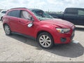 2013 Mitsubishi Outlander Sport — photo 1 of 16 | VIN 4A4AP4AU3DE007678