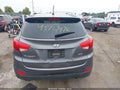 2014 Hyundai Tucson — photo 16 of 16 | VIN KM8JUCAG7EU800893