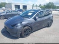 2022 Tesla Model Y — photo 2 of 18 | VIN 7SAYGDEE4NF446917