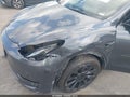 2022 Tesla Model Y — photo 6 of 18 | VIN 7SAYGDEE4NF446917