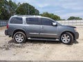 2014 Nissan Armada — photo 14 of 18 | VIN 5N1BA0ND4EN613021
