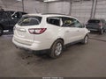2014 Chevrolet Traverse — photo 4 of 16 | VIN 1GNKVHKD4EJ277610