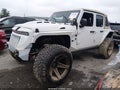 2023 Jeep Wrangler — photo 2 of 22 | VIN 1C4HJXDG3PW526016