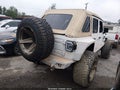 2023 Jeep Wrangler — photo 4 of 22 | VIN 1C4HJXDG3PW526016