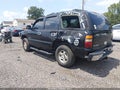 2004 Chevrolet Tahoe — photo 3 of 16 | VIN 1GNEC13V74R151369