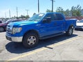 2009 Ford F-150 — photo 2 of 17 | VIN 1FTPW12V49KC73228