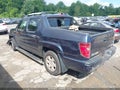 2011 Honda Ridgeline — photo 3 of 16 | VIN 5FPYK1F4XBB002864