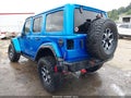 2022 Jeep Wrangler Unlimited — photo 3 of 22 | VIN 1C4HJXFN5NW119436