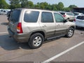 2002 Mazda Tribute — photo 4 of 13 | VIN 4F2YU091X2KM51575