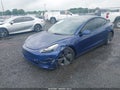 2022 Tesla Model 3 — photo 6 of 17 | VIN 5YJ3E1EA8NF372197