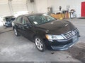 2014 Volkswagen Passat — photo 1 of 16 | VIN 1VWBH7A3XEC045792