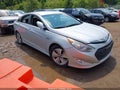 2015 Hyundai Sonata Hybrid — photo 1 of 13 | VIN KMHEC4A44FA127693