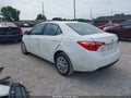 2018 Toyota Corolla — photo 3 of 17 | VIN 5YFBURHE7JP839524