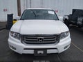 2014 Honda Ridgeline — photo 13 of 17 | VIN 5FPYK1F53EB008485