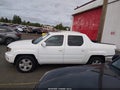 2014 Honda Ridgeline — photo 15 of 17 | VIN 5FPYK1F53EB008485