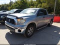 2009 Toyota Tundra — photo 2 of 16 | VIN 5TFRU541X9X017534